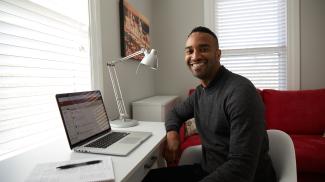 Student at desk with laptop