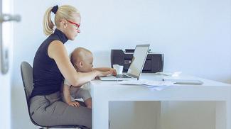 Mother earning her degree while raising a child.