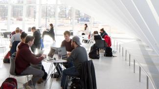 Students collaborating in Isenberg's Business Innovation Hub.